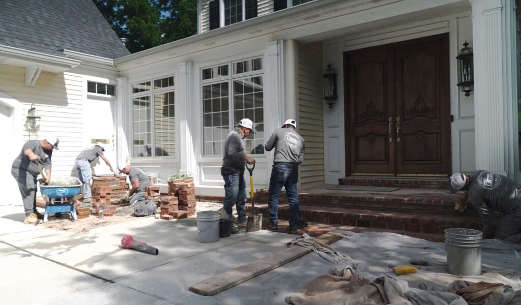 Galati Crew working on patio brickwork